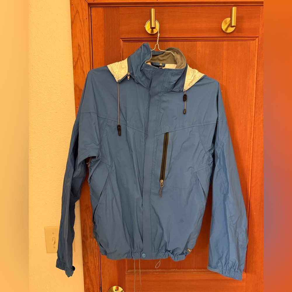 REI Men's Blue Rain Jacket with White Hood Lining